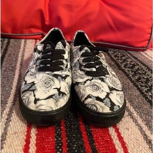 Black shoes with white roses